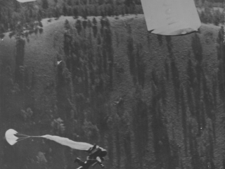 Smokejumper soon after leaving plane, Lolo National Forest, Montana.