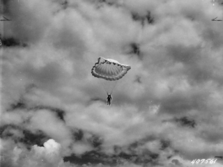 Smokejumper approaching ground. Six Mile, near Remount Depot.