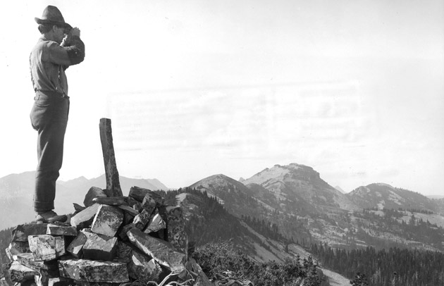 Ranger Gordon on Fire Patrol Duty, Squaw Peak Fire Lookout Station, Cabinet National Forest, Montana, 1909.