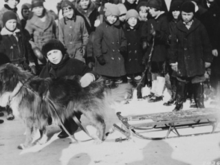 Joy Glattus and Buster, winners of single dog race, Munising, MI.