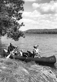George Nyman family canoeing on Moose Lake, Superior National Forest, 1964.